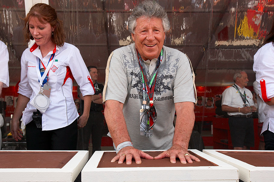Mario Andretti (Formula 1 World Champion in 1978) makes a hand print