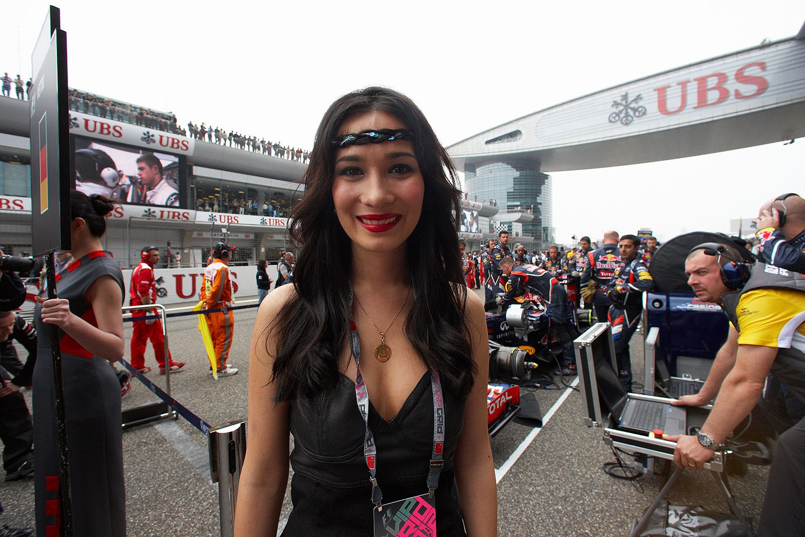 Chinese actress / model / writer Celina Jade on the grid besides her star's race car, Vettel started filming with her for a martial arts short film of Red Bull sponsor Infiniti