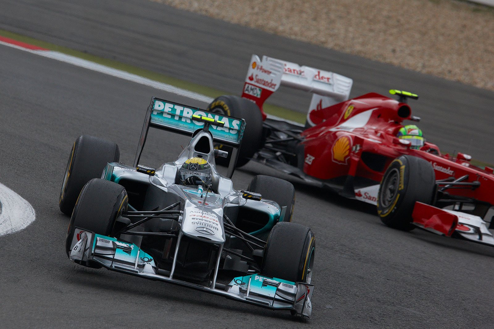 Nico Rosberg, Mercedes GP, stays in front of Felipe Massa's Ferrari