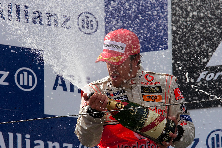 Winner Alonso sprays champagne