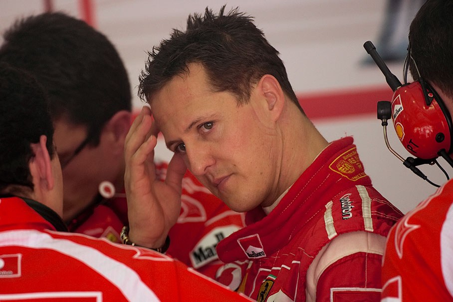 Michael Schumacher in the pits after Friday morning qualification session