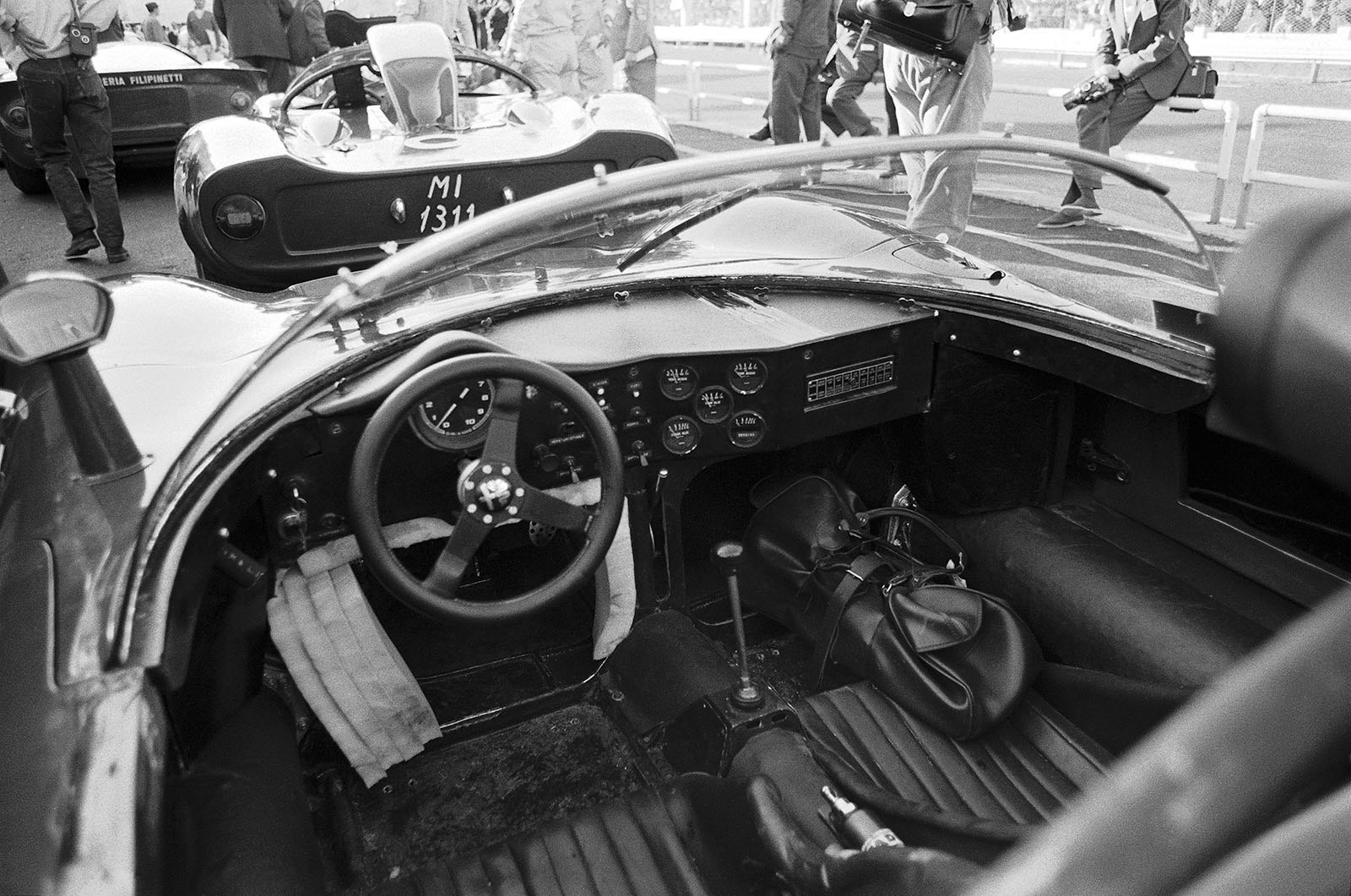 The customised cockpit of a waiting Alfa Romeo T33