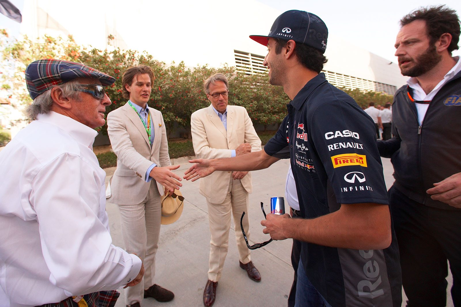 The Earl of March and his son being intoduced by Jackie Stewart to Red Bull driver Daniel Ricciardo, Bahrain Grand Prix, 2015