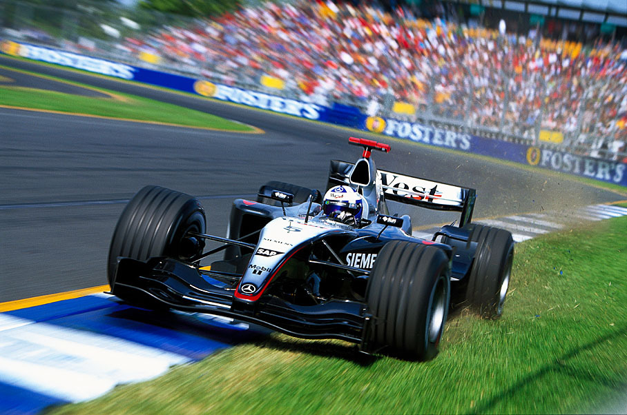 David Coulthard cutting the grass