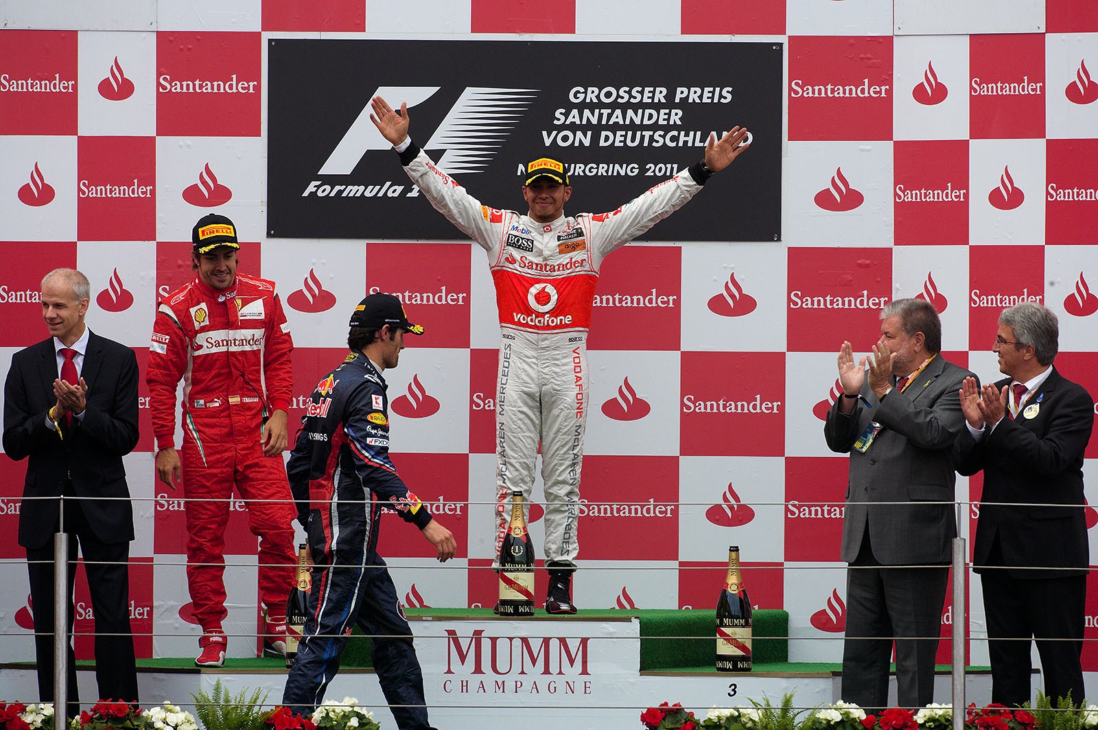 Race winner Lewis Hamilton of McLaren on podium after the German GP