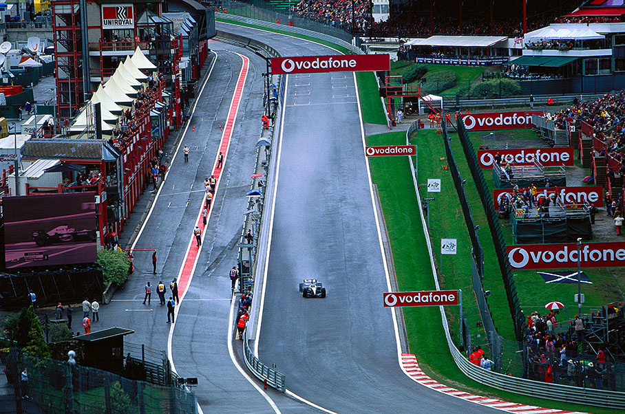 Kimi Raikkonen gliding into Eau Rouge