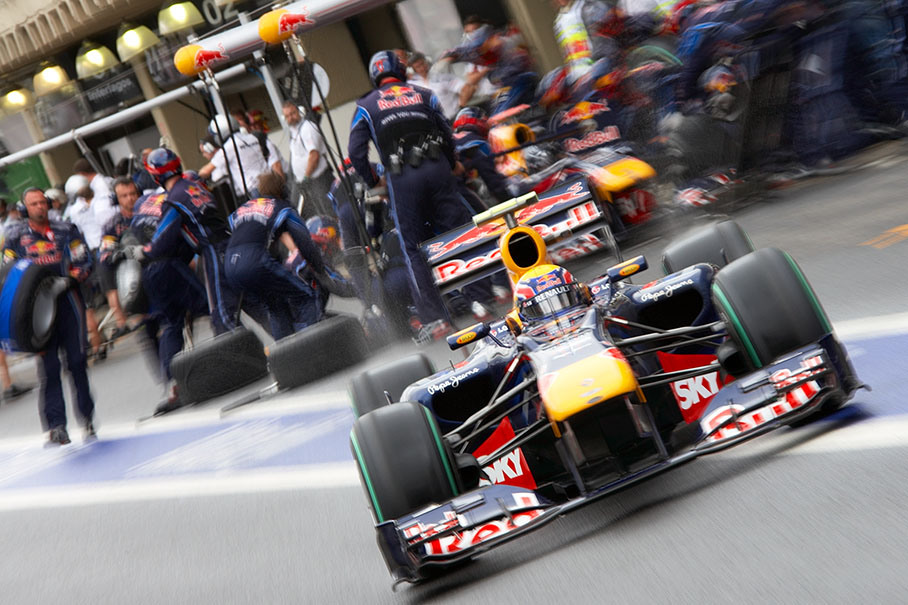 Mark Webber eject from Red Bull Racing pits to a rainy Q3