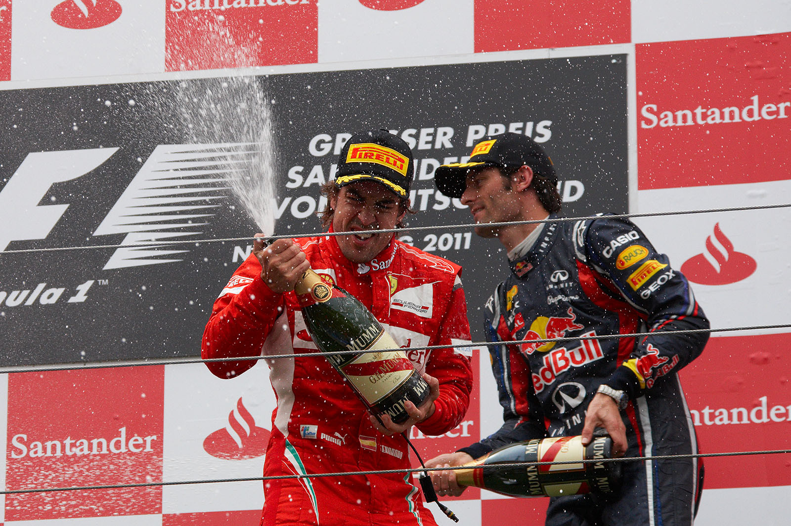 Champagne showers for second placed Alonso and third Webber