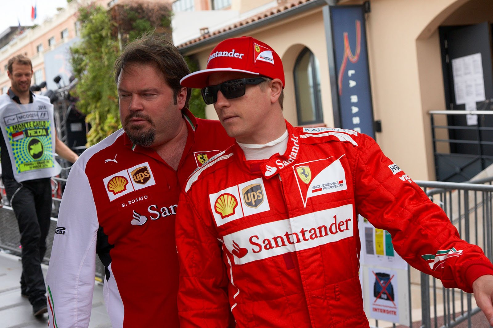 Ferrari driver Kimi Raikkonen arrives in the paddock