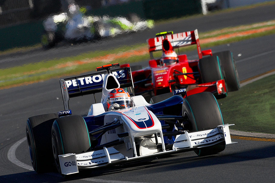 Robert Kubica, BMW Sauber F1, in front of Raikkonen and Barrichello