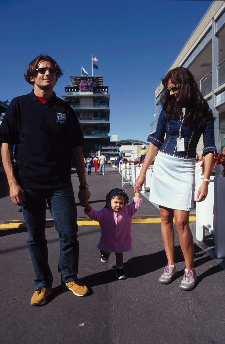 Giancarlo Fisichella with his wife Luna and their child.
